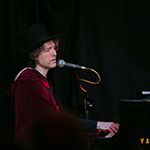 David Singing at Piano